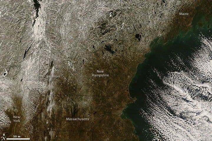 NASA Terra satellite image of New England on December 13, 2008, showing the icy aftermath of the December 11-12 ice storm — ice glaze visible across central Massachusetts, southern New Hampshire, and northwest Connecticut.